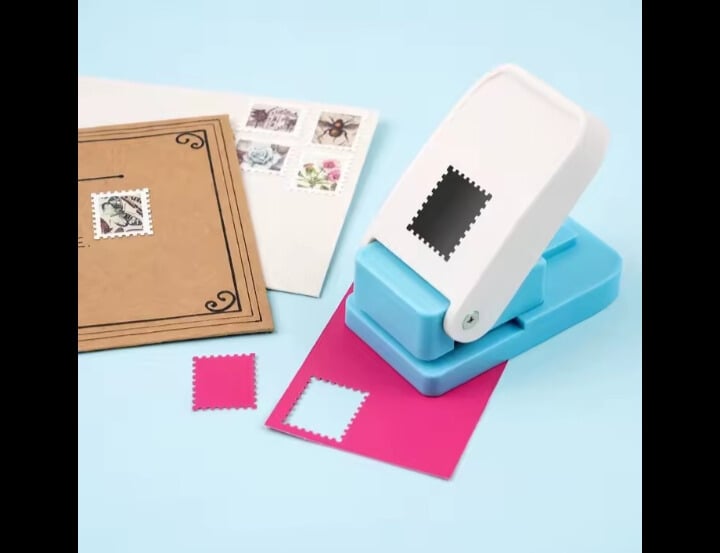 Postage stamp puncher